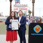 Clark County Commission Chairman Michael Naft poses at the Welcome to Fabulous Las Vegas sign during the America250 kickoff ceremony.