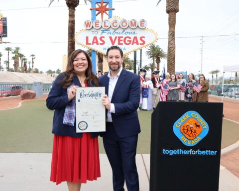 Clark County Commission Chairman Michael Naft poses at the Welcome to Fabulous Las Vegas sign during the America250 kickoff ceremony.