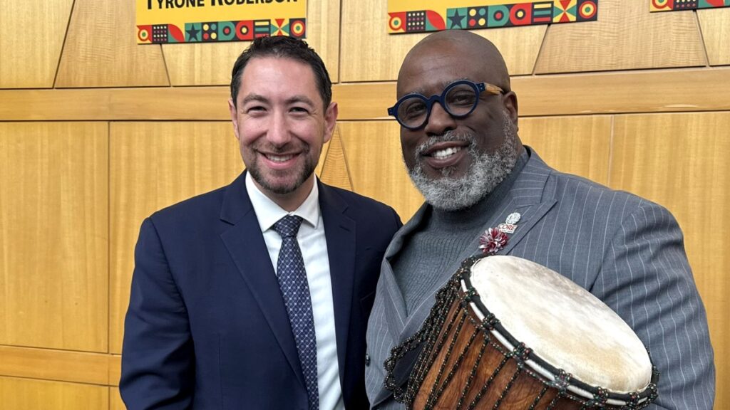 Commissioner Michael Naft (left) with Jeff Jones, executive director of CORE, during a Black History Month recognition ceremony at the Clark County Commission chambers.