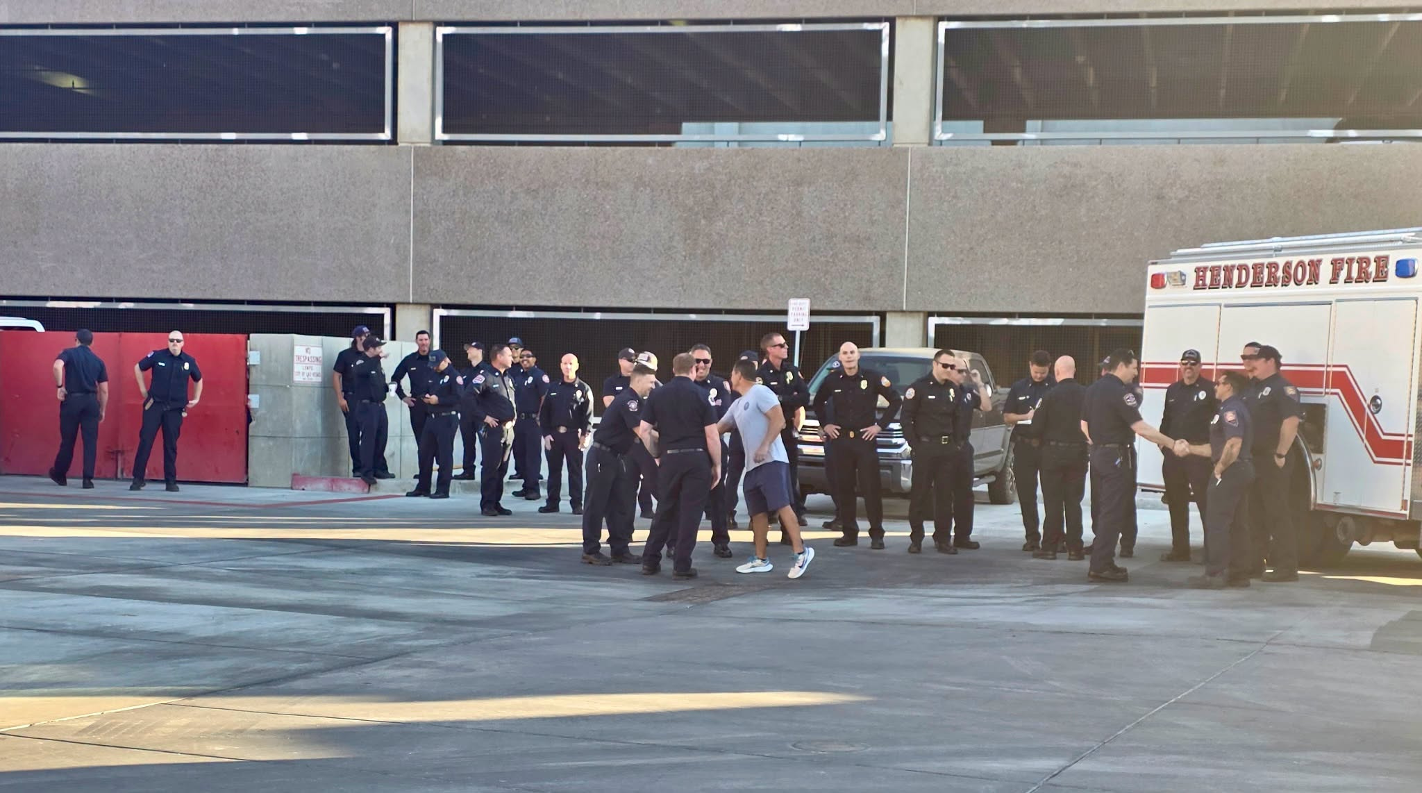 Southern Nevada firefighters gathered near Henderson Fire emergency apparatus